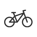 Schwarze Fahrradkonstruktion auf weißem Hintergrund in einem runden Ausschnitt.